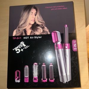 5 in 1 dryer curler and brush .